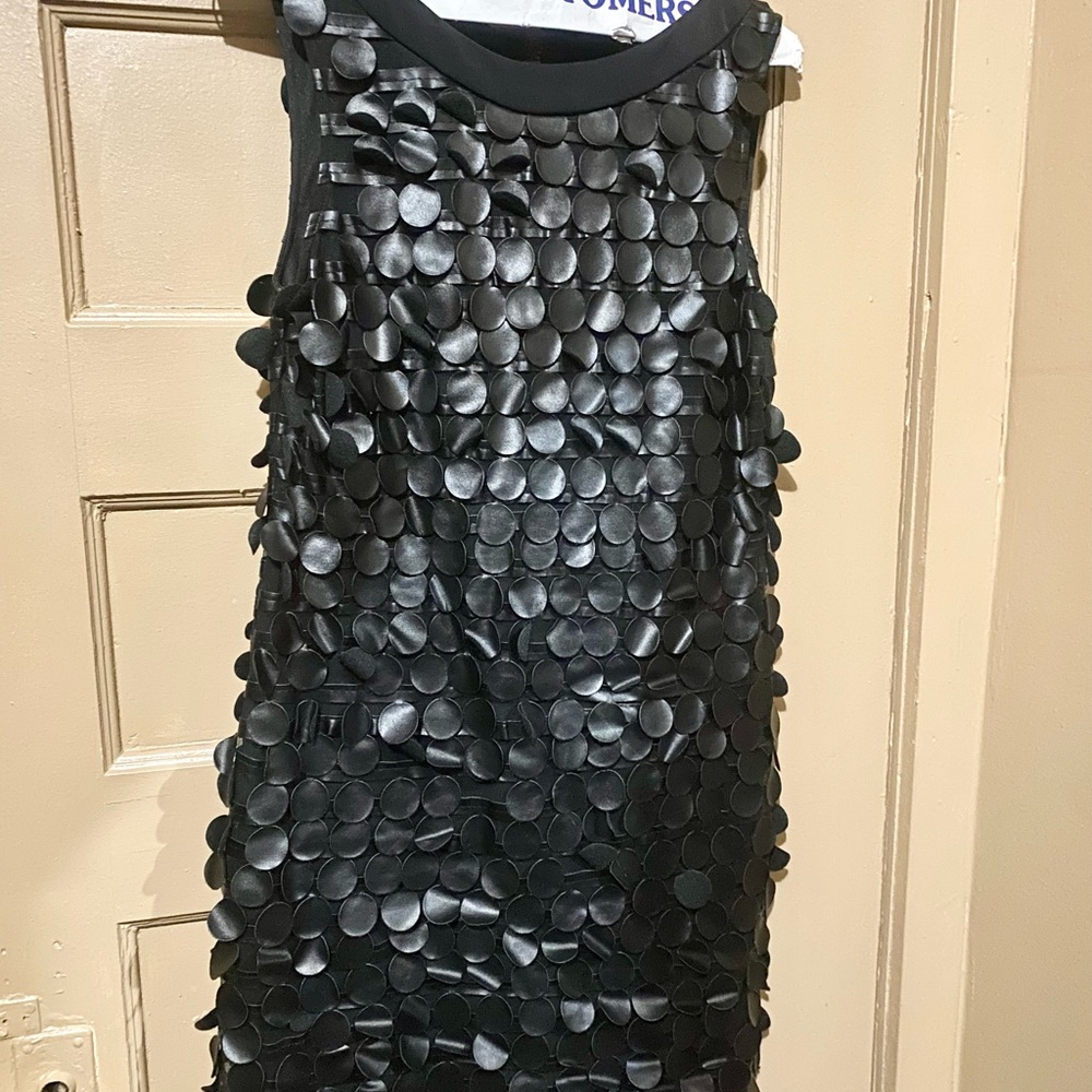 Chic black leather detail dress.
